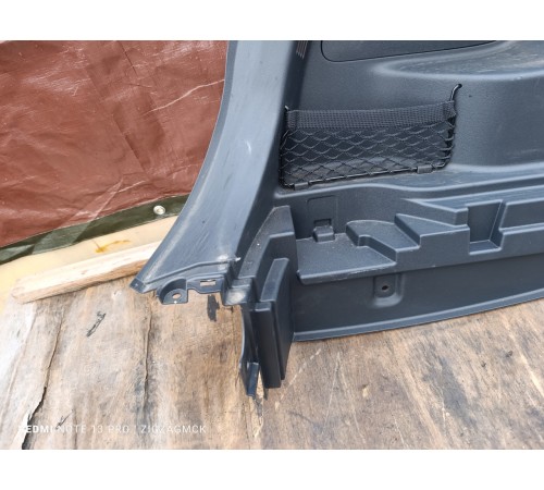 Обшивка багажника левая