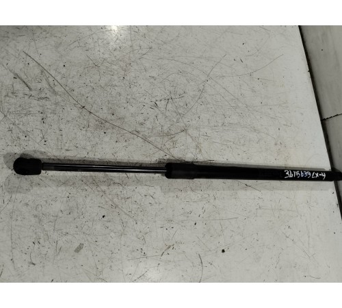 Амортизатор крышки багажника левый