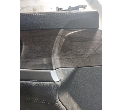 Обшивка двери передняя левая