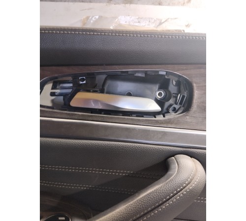 Обшивка двери передняя левая