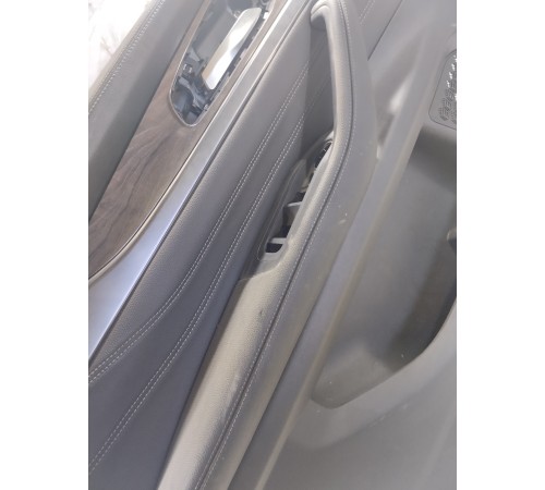 Обшивка двери передняя левая