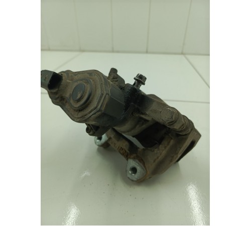 Суппорт тормозной задний левый