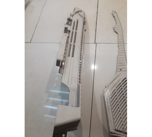 Обшивка багажника (левая)