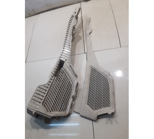 Обшивка багажника (левая)