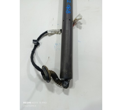 Амортизатор крышки багажника левый