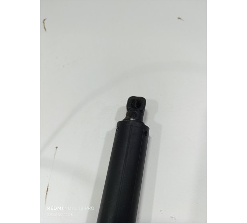 Амортизатор крышки багажника левый