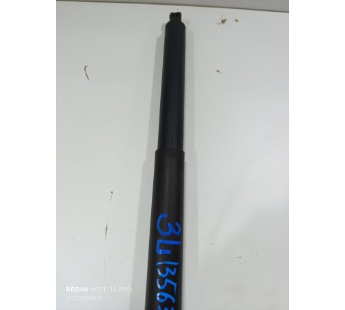 Амортизатор крышки багажника левый