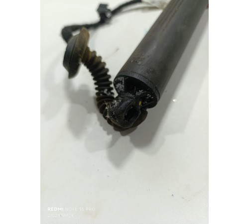 Амортизатор крышки багажника левый