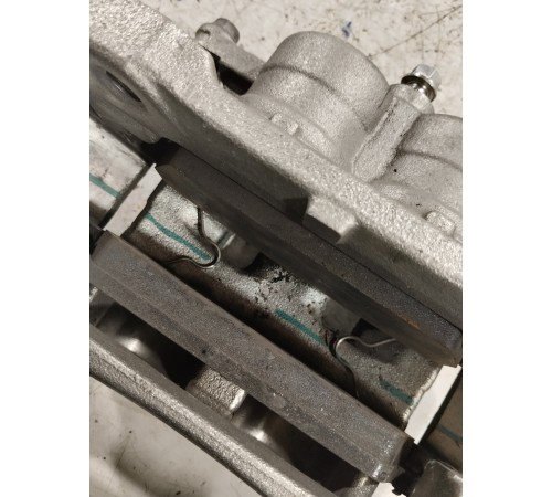 Суппорт тормозной передний левый