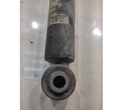 Амортизатор (задний, левый)