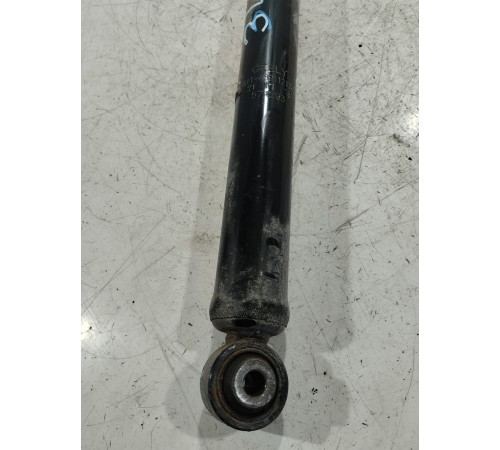 Амортизатор задний левый