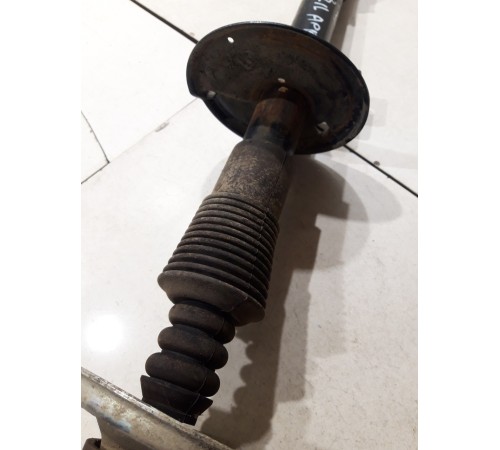 Амортизатор подвески задний левый