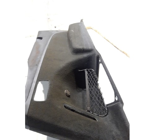 Обшивка багажника (левая)