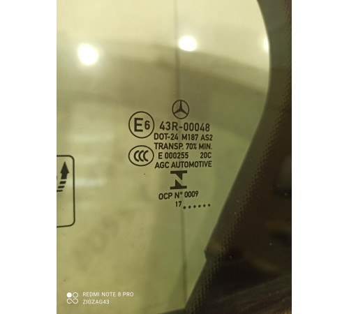 Стекло двери глухое (заднее левое)