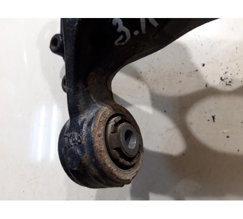 Кулак поворотный (задний, левый)