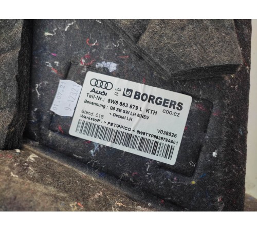 Обшивка багажника(левая)