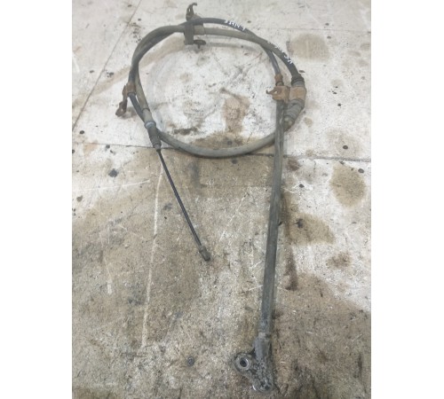 Трос стояночного тормоза левый