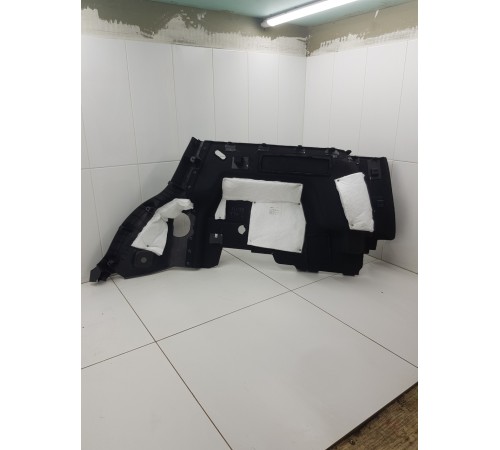 Обшивка багажника левая