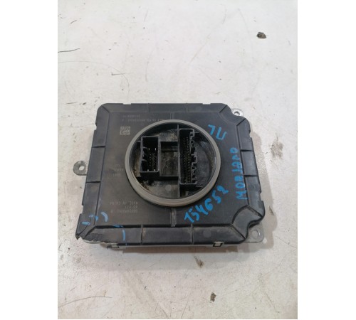 Блок розжига фар левый