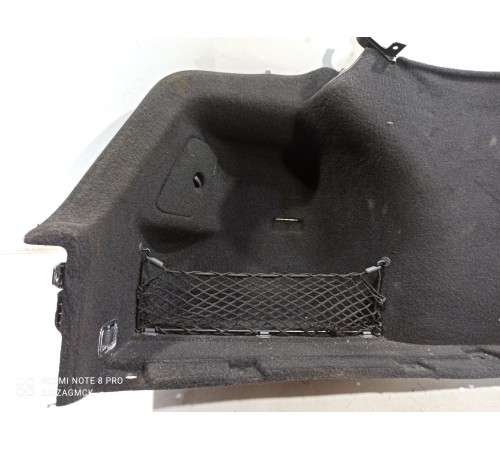 Обшивка багажника левая