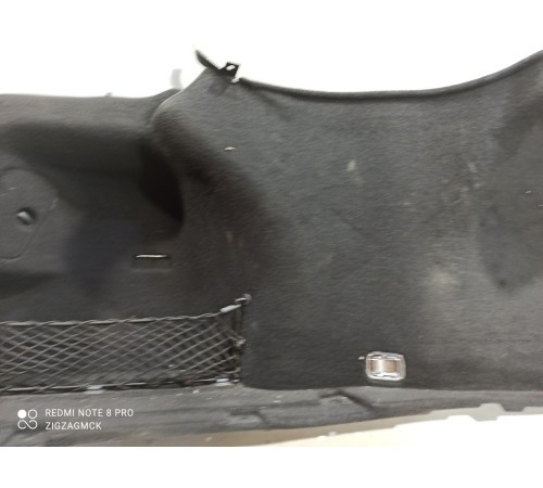 Обшивка багажника левая