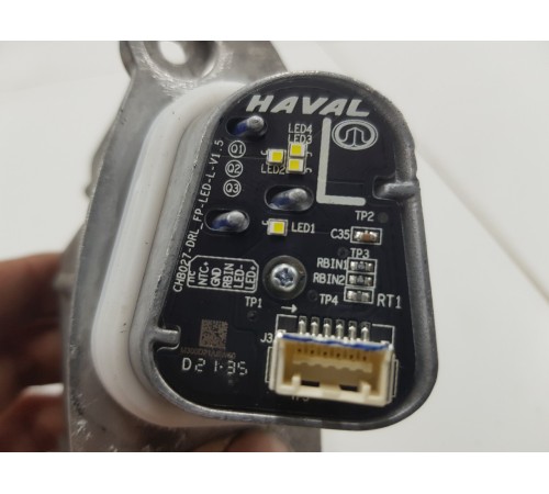 Блок розжига фар левый