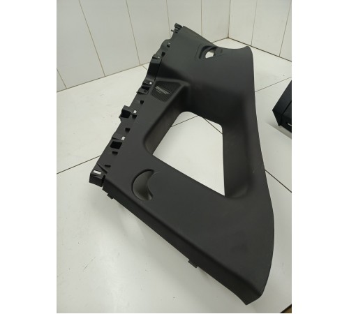 Обшивка багажника левая