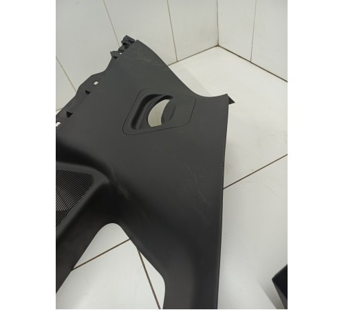 Обшивка багажника левая