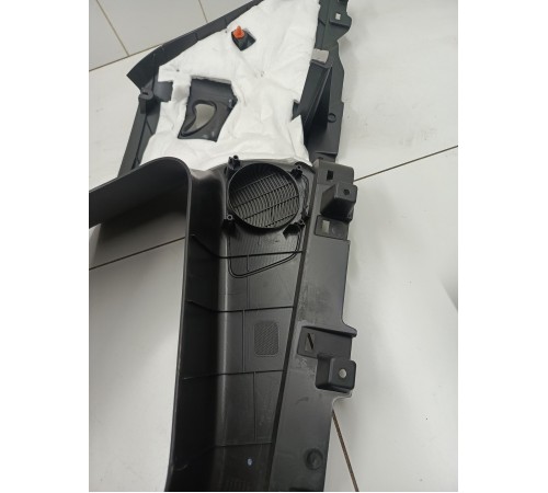 Обшивка багажника левая