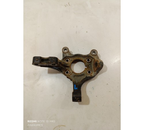 Кулак поворотный передний левый