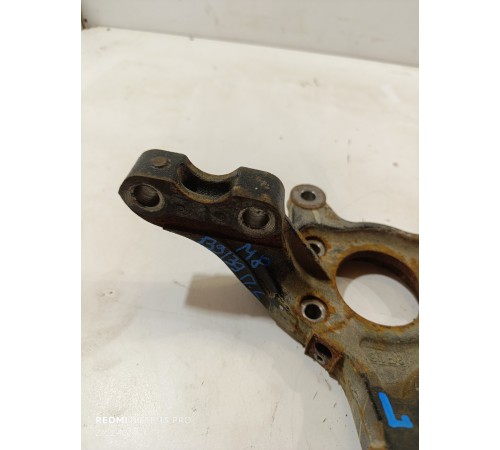 Кулак поворотный передний левый