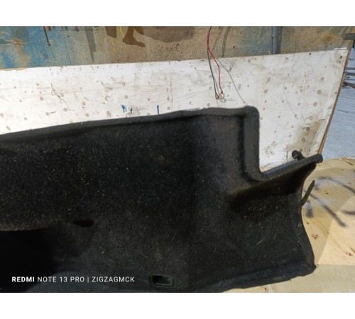 Обшивка багажника левая