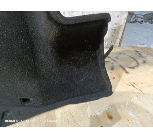 Обшивка багажника левая