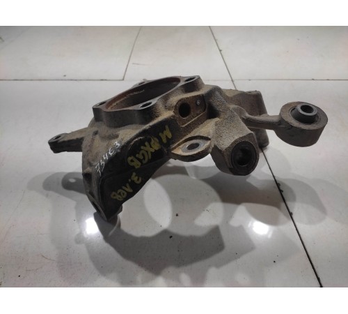 Кулак поворотный (задний, левый)