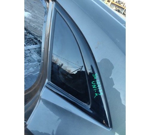 Глухое стекло заднее левое