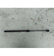 Амортизатор ящика вещевого левый