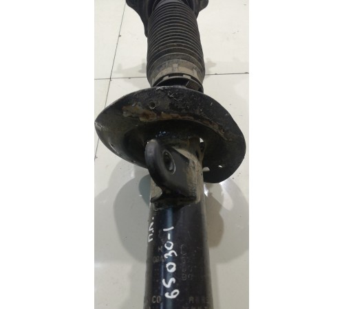 Амортизатор (передний, левый)