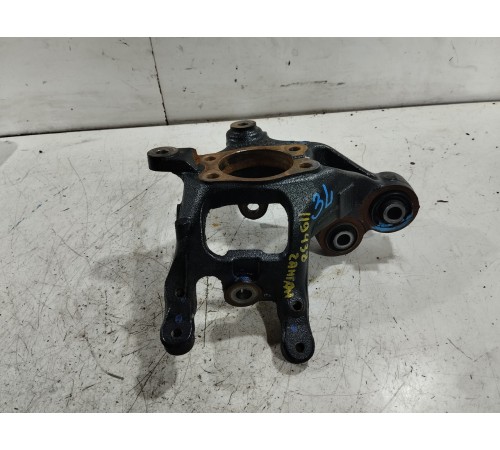 Кулак поворотный задний левый