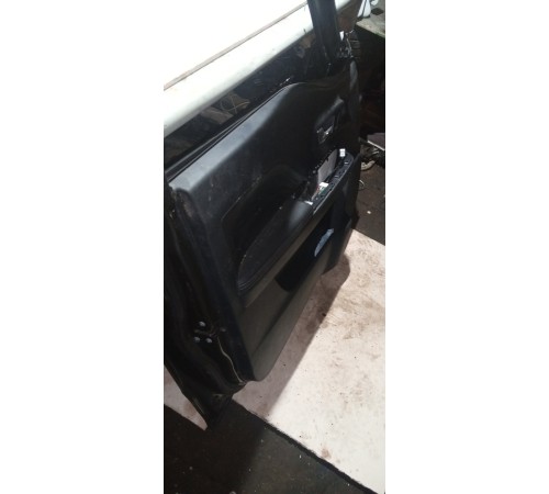 Обшивка двери Передняя Левая