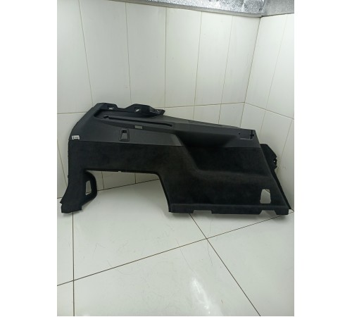 Обшивка багажника левая