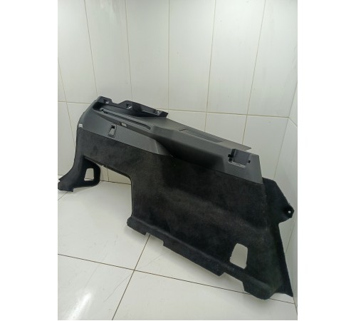 Обшивка багажника левая