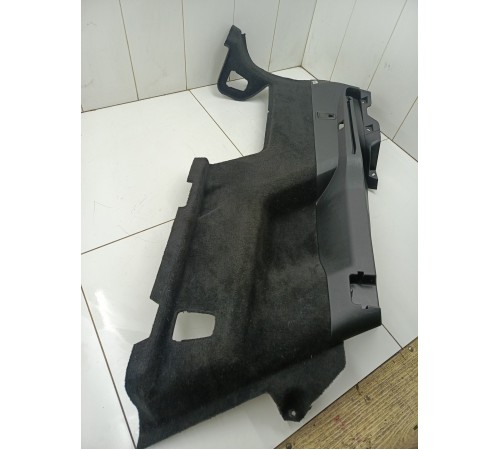 Обшивка багажника левая