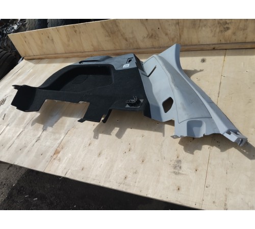 Обшивка багажника левая