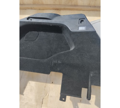 Обшивка багажника левая