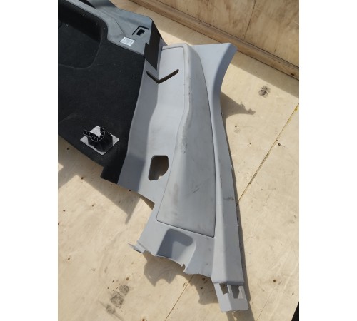 Обшивка багажника левая