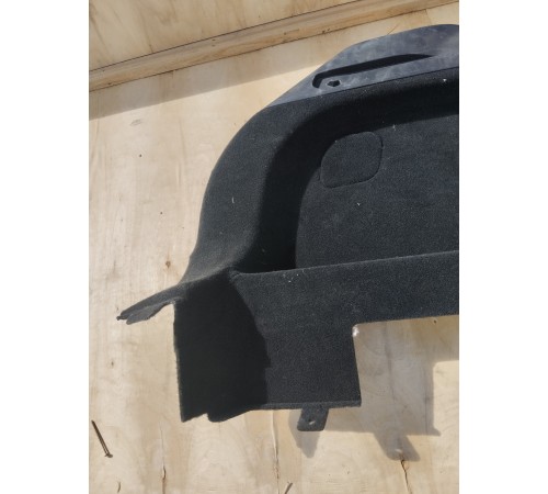 Обшивка багажника левая