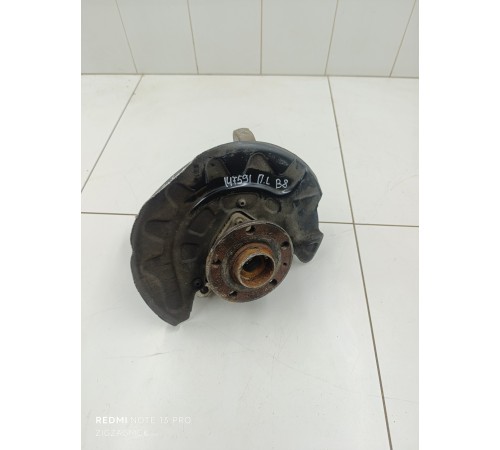 Кулак поворотный передний левый в сборе