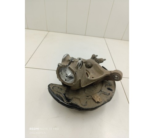 Кулак поворотный передний левый в сборе