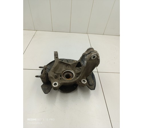 Кулак поворотный передний левый в сборе