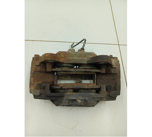 Суппорт тормозной передний левый